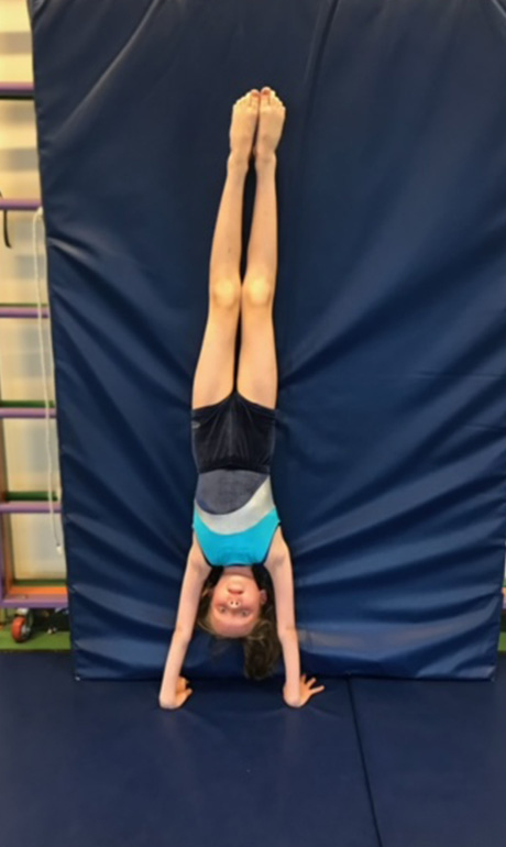 Girl doing handstand